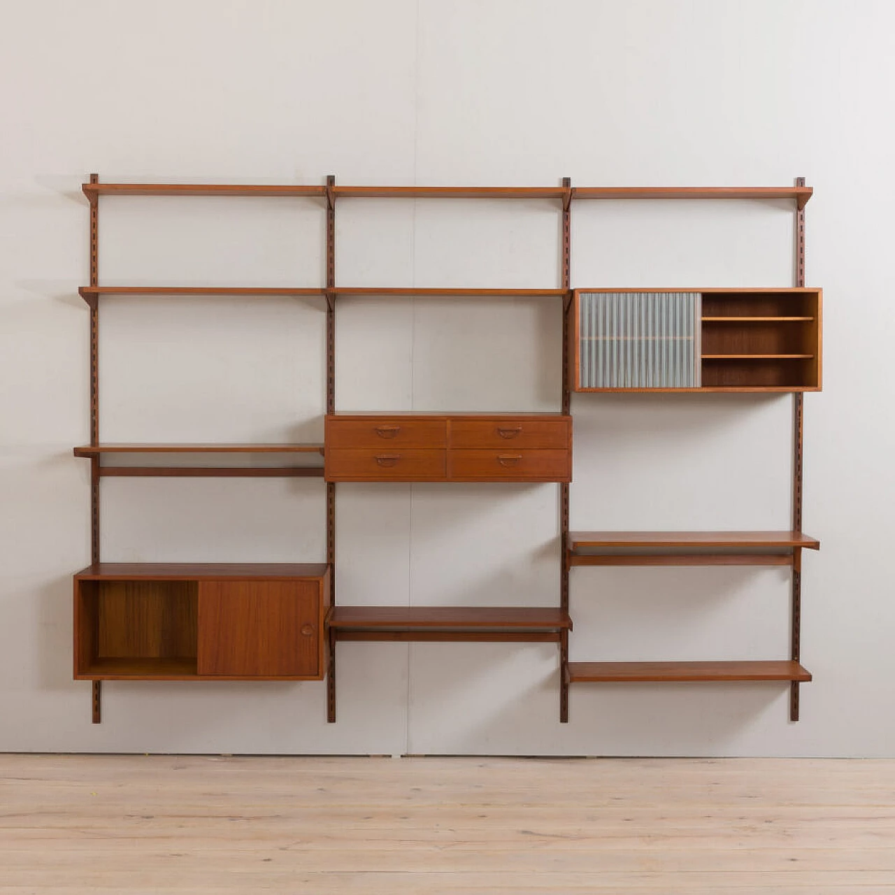 Modular teak bookcase with nine wall shelves and three cabinets by K. Kristiansen for FM Mobler, 1960s 9