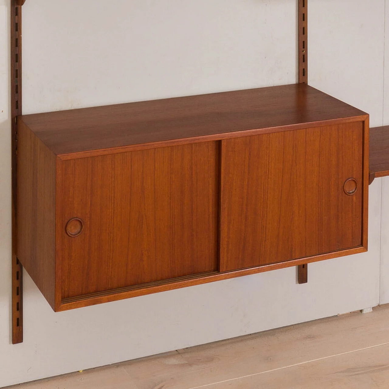 Modular teak bookcase with nine wall shelves and three cabinets by K. Kristiansen for FM Mobler, 1960s 12