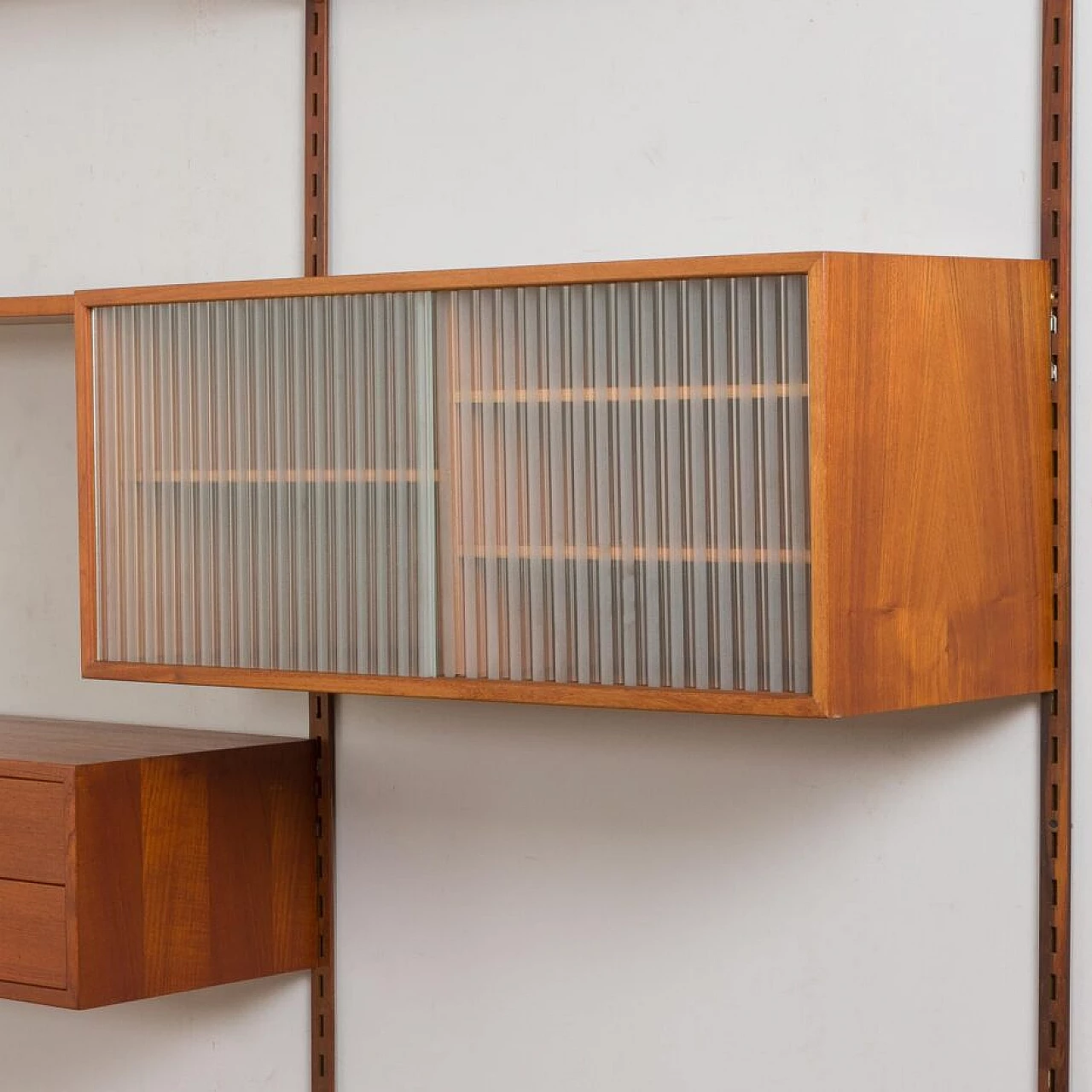 Modular teak bookcase with nine wall shelves and three cabinets by K. Kristiansen for FM Mobler, 1960s 14