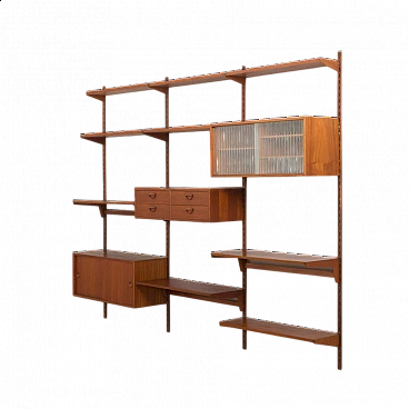 Modular teak bookcase with nine wall shelves and three cabinets by K. Kristiansen for FM Mobler, 1960s