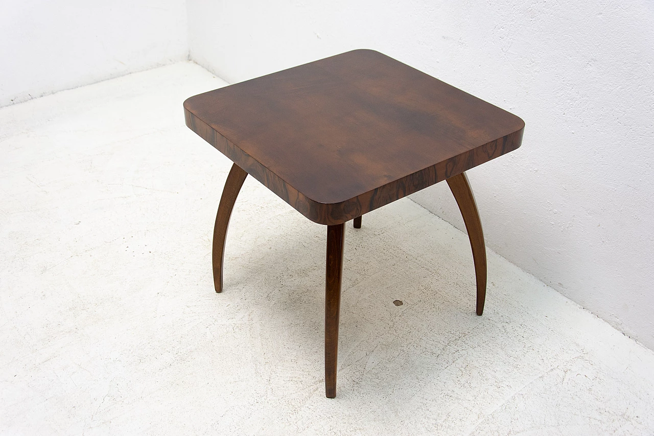 Spider table H 259 in walnut by Jindřich Halabala, 1950s 13