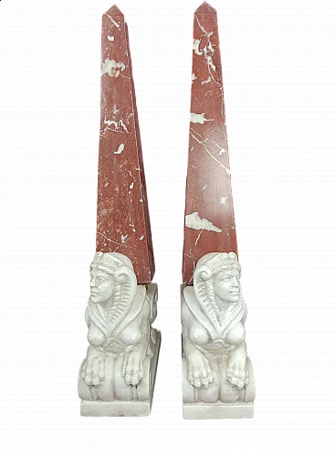 Pair of red and white marble obelisks with sphinx, early 20th century