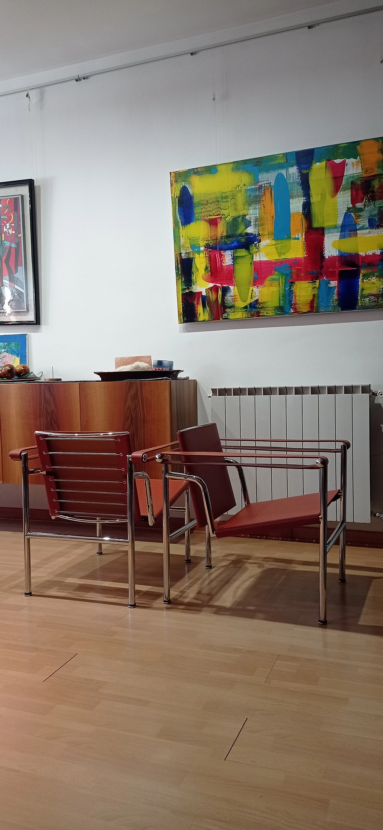 Pair of LC1 leather armchairs by Le Corbusier, P. Jeanneret and C. Perriand for Alivar, 1980s 117