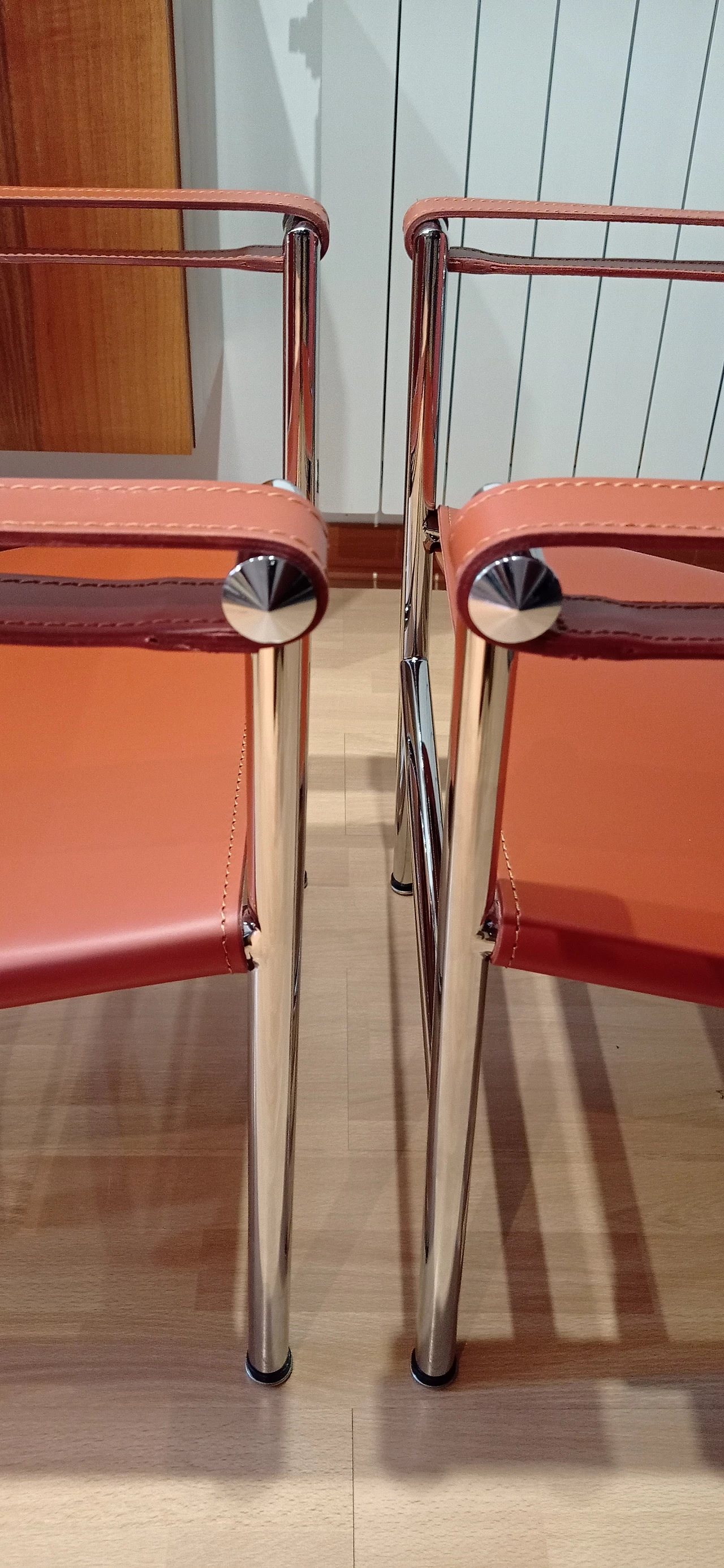 Pair of LC1 leather armchairs by Le Corbusier, P. Jeanneret and C. Perriand for Alivar, 1980s 162