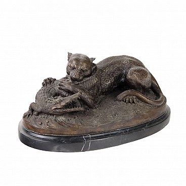 Bronze tiger and crocodile sculpture on marble base