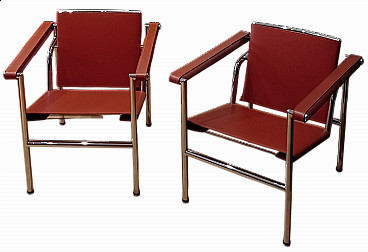 Pair of LC1 leather armchairs by Le Corbusier, P. Jeanneret and C. Perriand for Alivar, 1980s