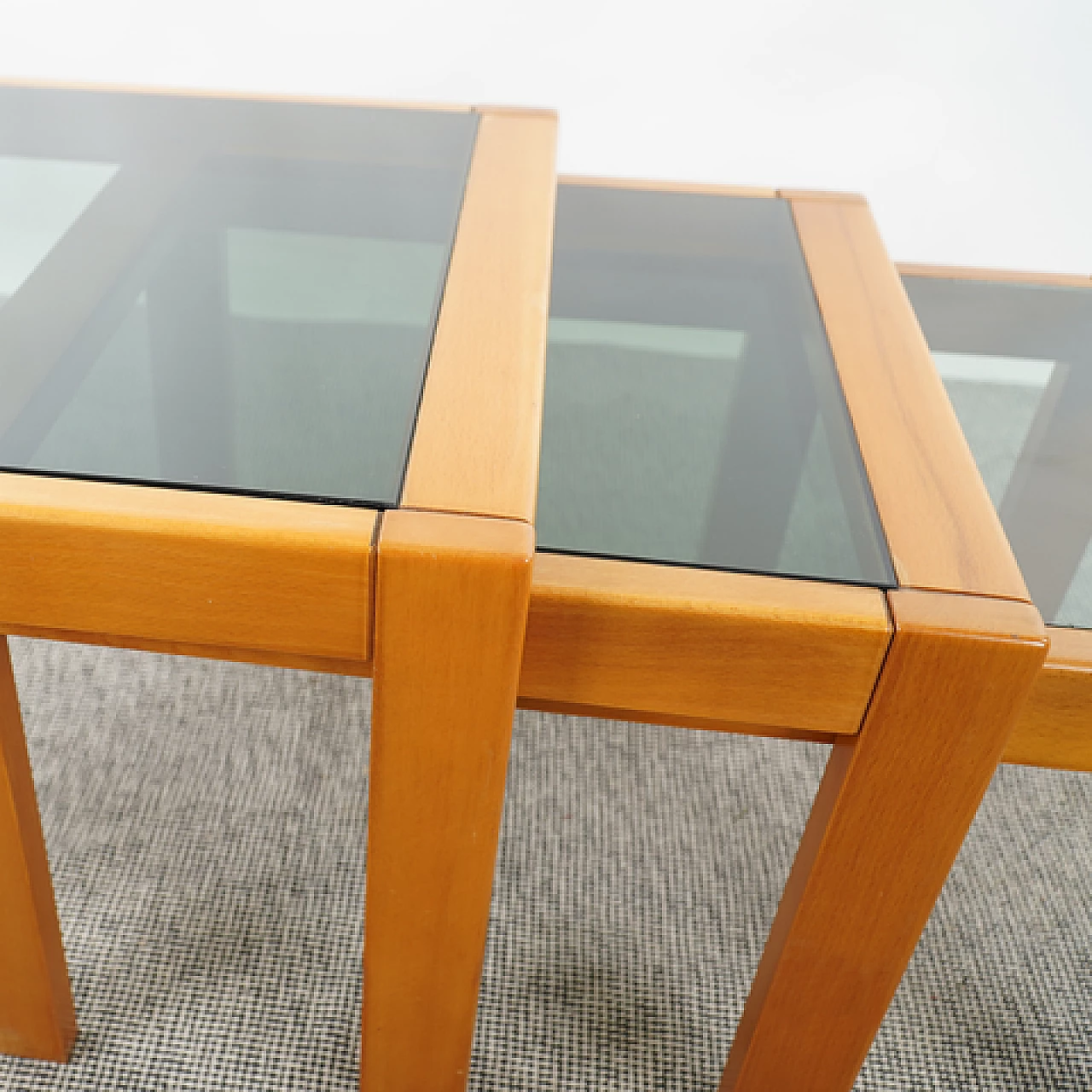 3 Wood and glass nesting tables, 1980s 4