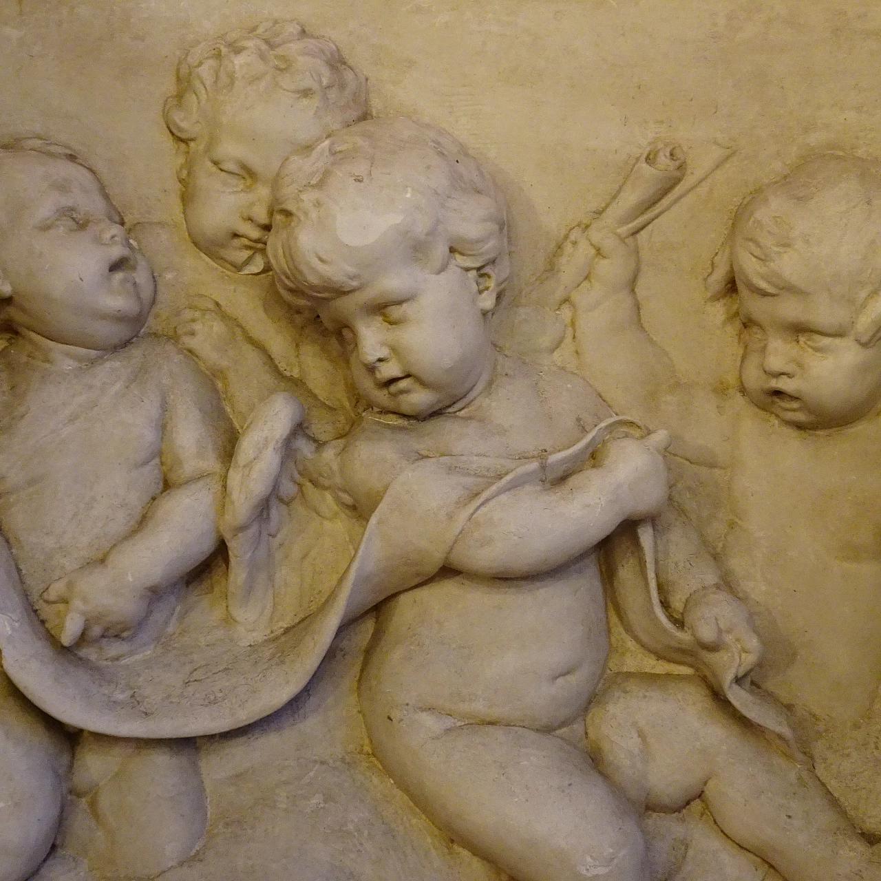 Plaster panel with high-relief of putti, early 20th century 2