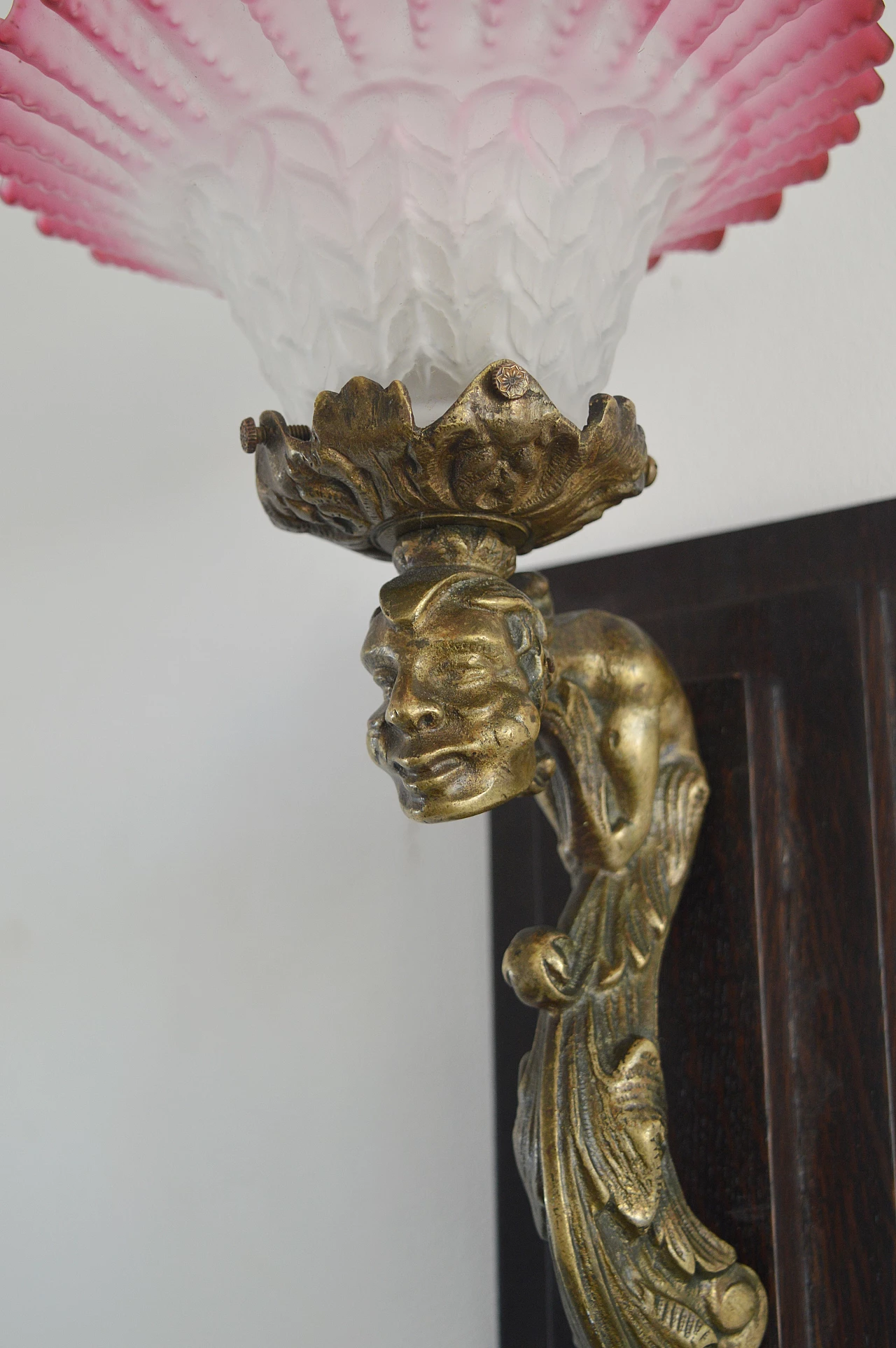 Pair of Art Deco wall lights with gargoyle and wooden bases, 1930s 2