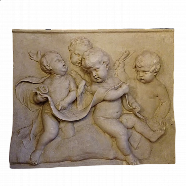Plaster panel with high-relief of putti, early 20th century