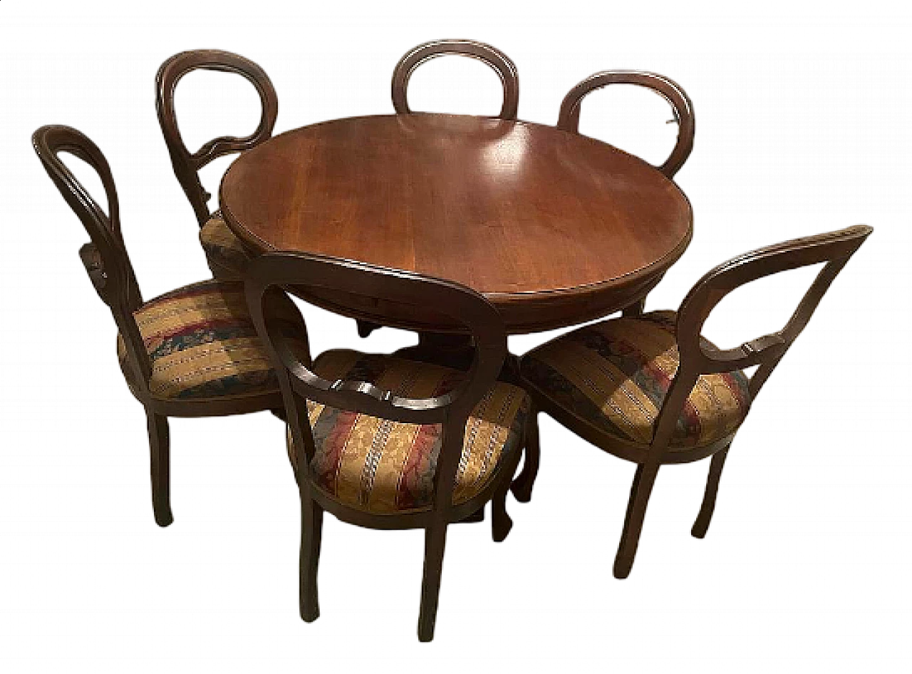 8 Chairs and round extendable table, 1920s 12