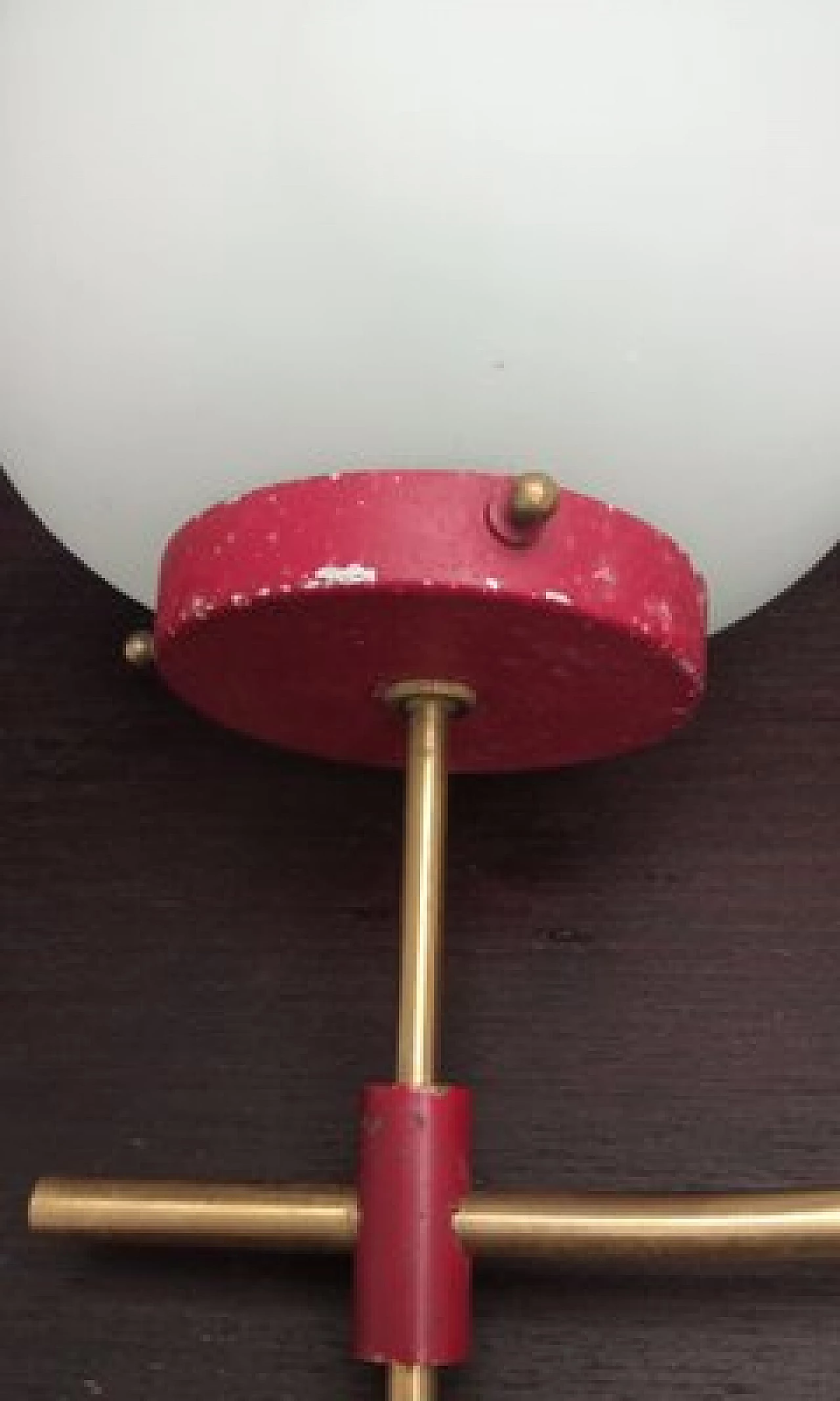 3 Glass, brass and red metal wall lights, 1950s 4