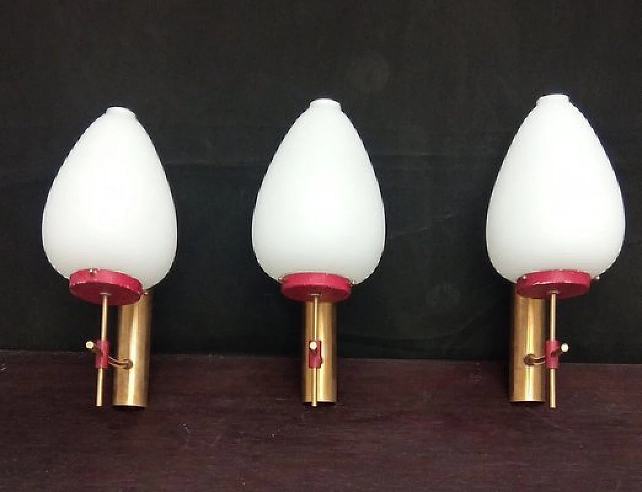 3 Glass, brass and red metal wall lights, 1950s 10