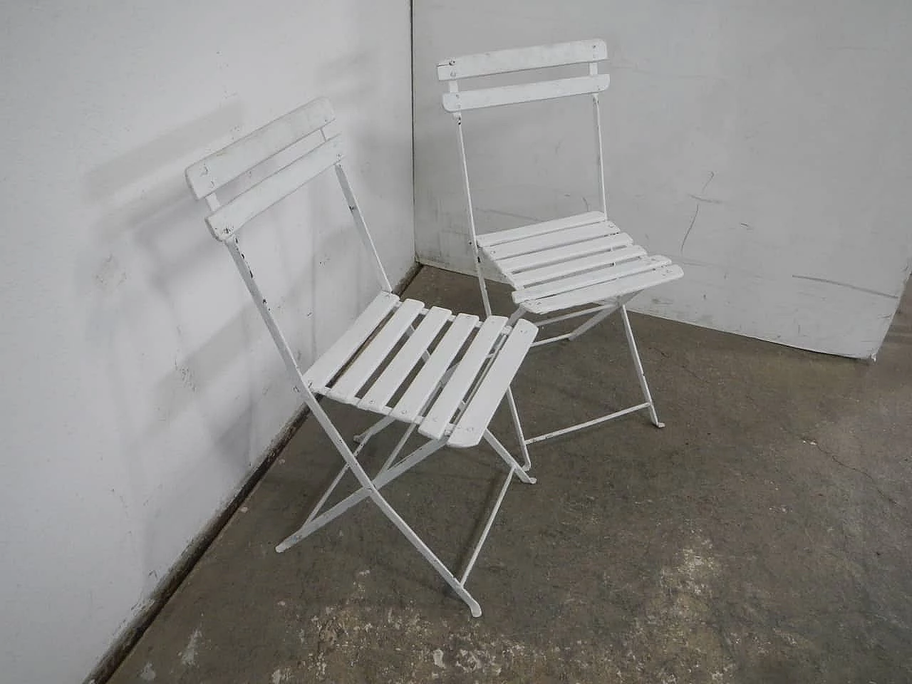Pair of white iron and spruce folding chairs, 1950s 2