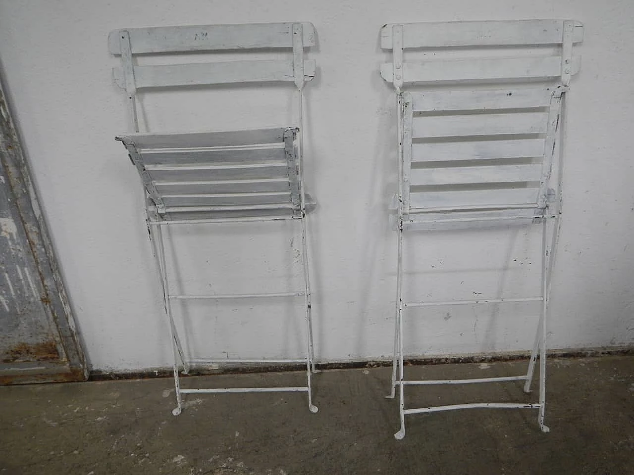 Pair of white iron and spruce folding chairs, 1950s 8
