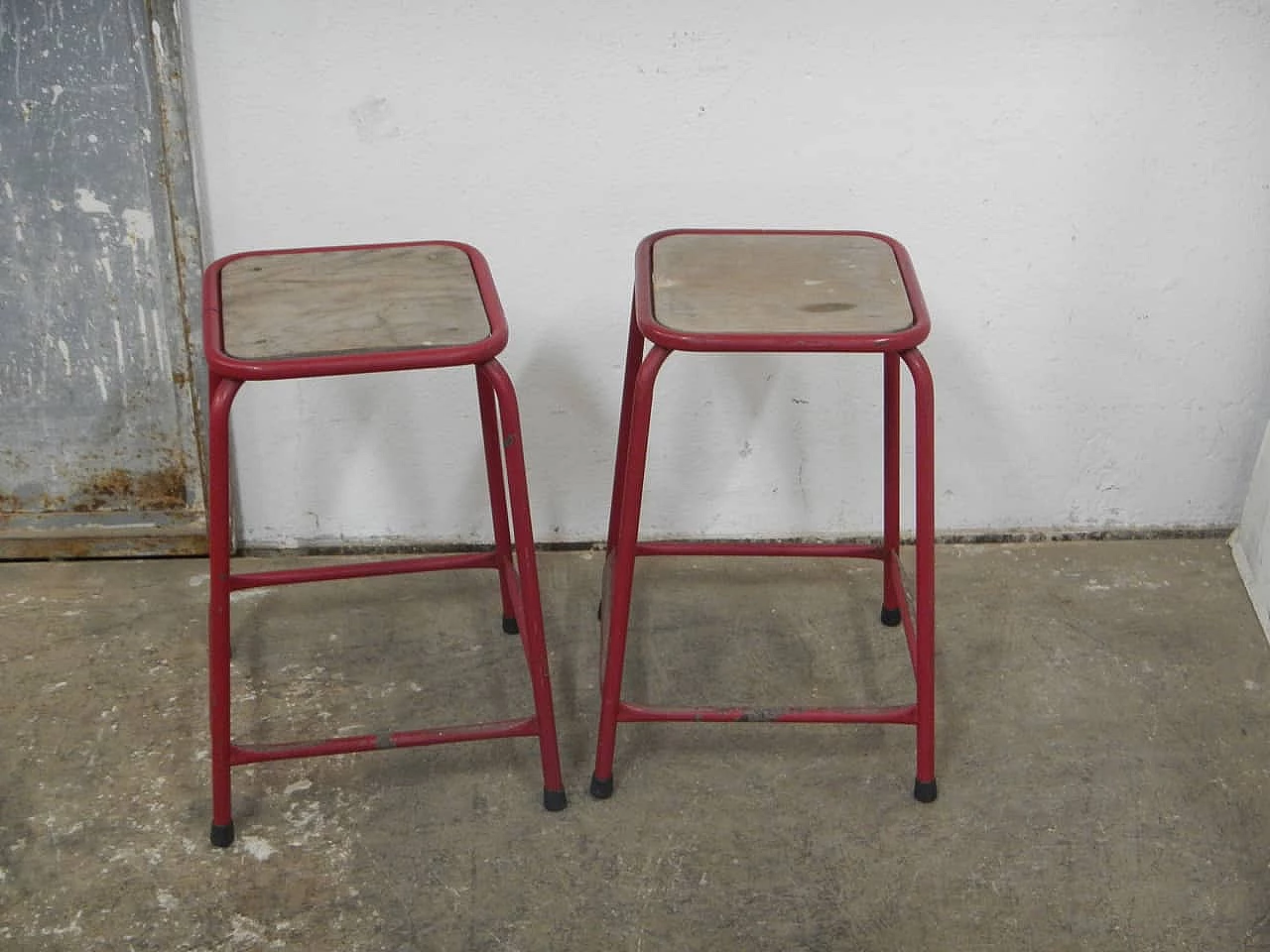 Pair of red iron and compressed wood stools, 1970s 3