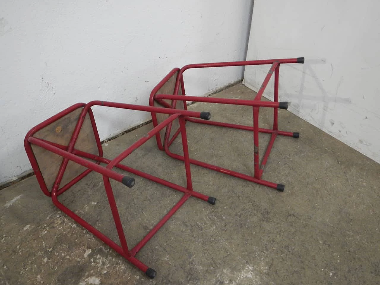 Pair of red iron and compressed wood stools, 1970s 5