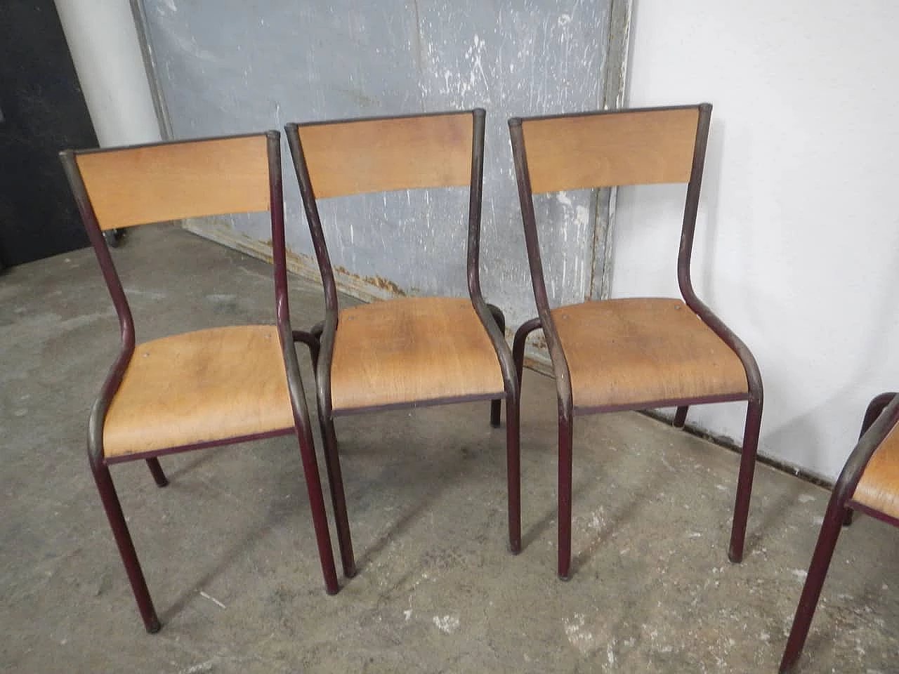 6 Burgundy iron and birch stackable chairs by Mullca, 1960s 5
