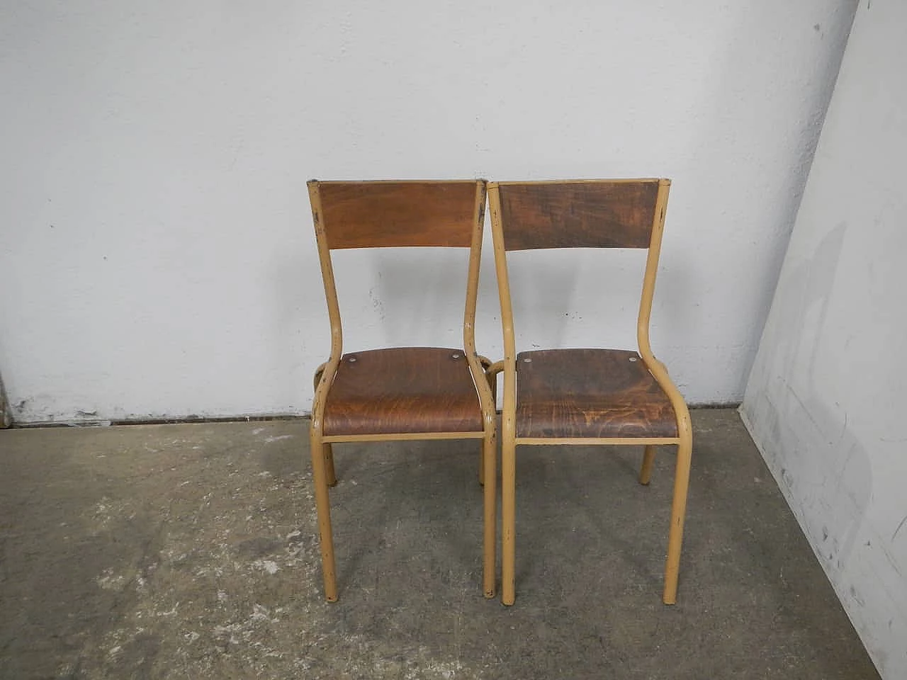 Pair of stackable iron chairs with birch blockboard seat by Mullca, 1960s 1
