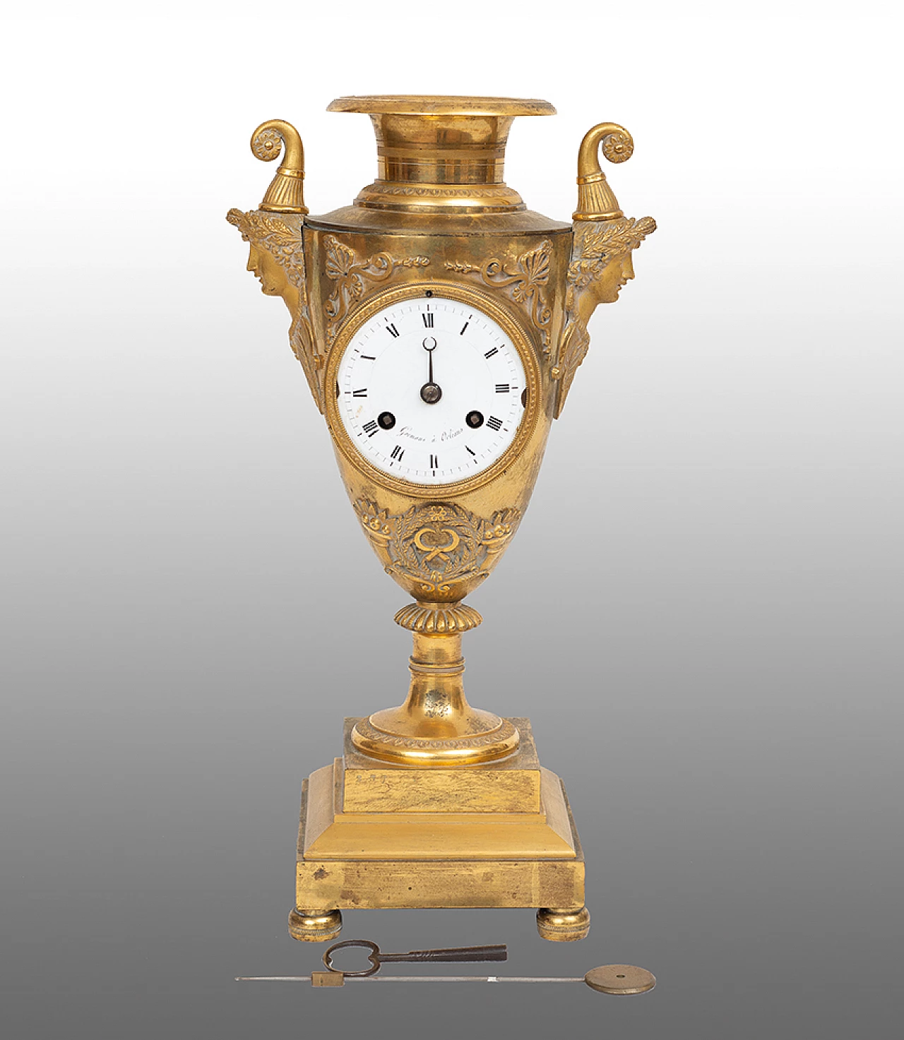 Chiselled gilded bronze vase-shaped Empire clock, early 19th century 1