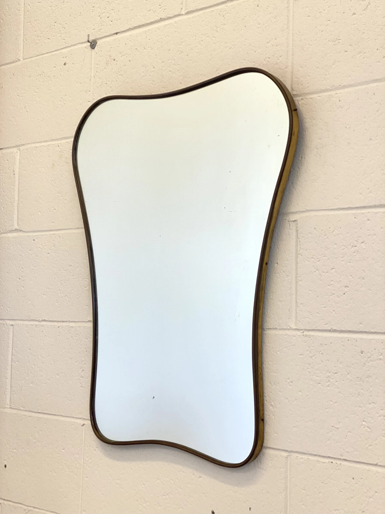 Mirror with shaped brass frame, 1950s 9
