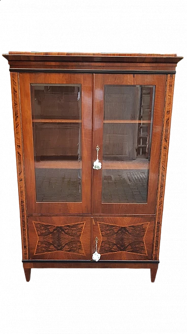 Walnut panelled showcase with octagonal lozenge panelling in briarwood, late 19th century