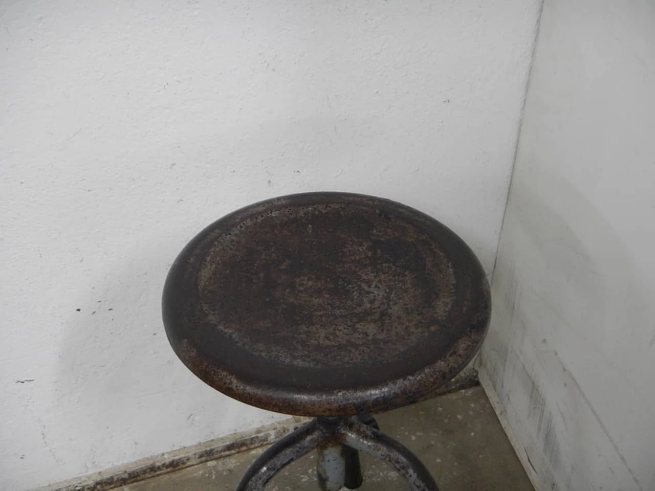Three-legged iron workshop stool, 1950s 3