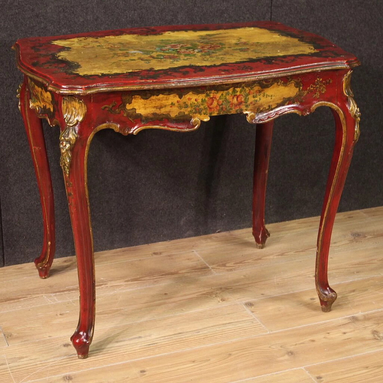 Venetian style lacquered and painted wood coffee table with floral motifs 1