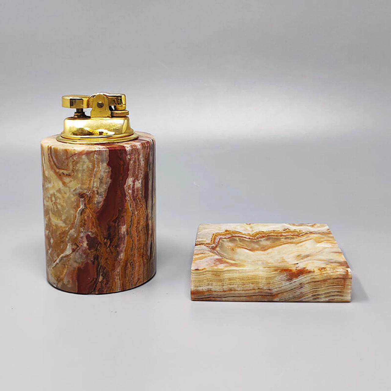 Onyx and gilded metal ashtray and table lighter, 1960s 1