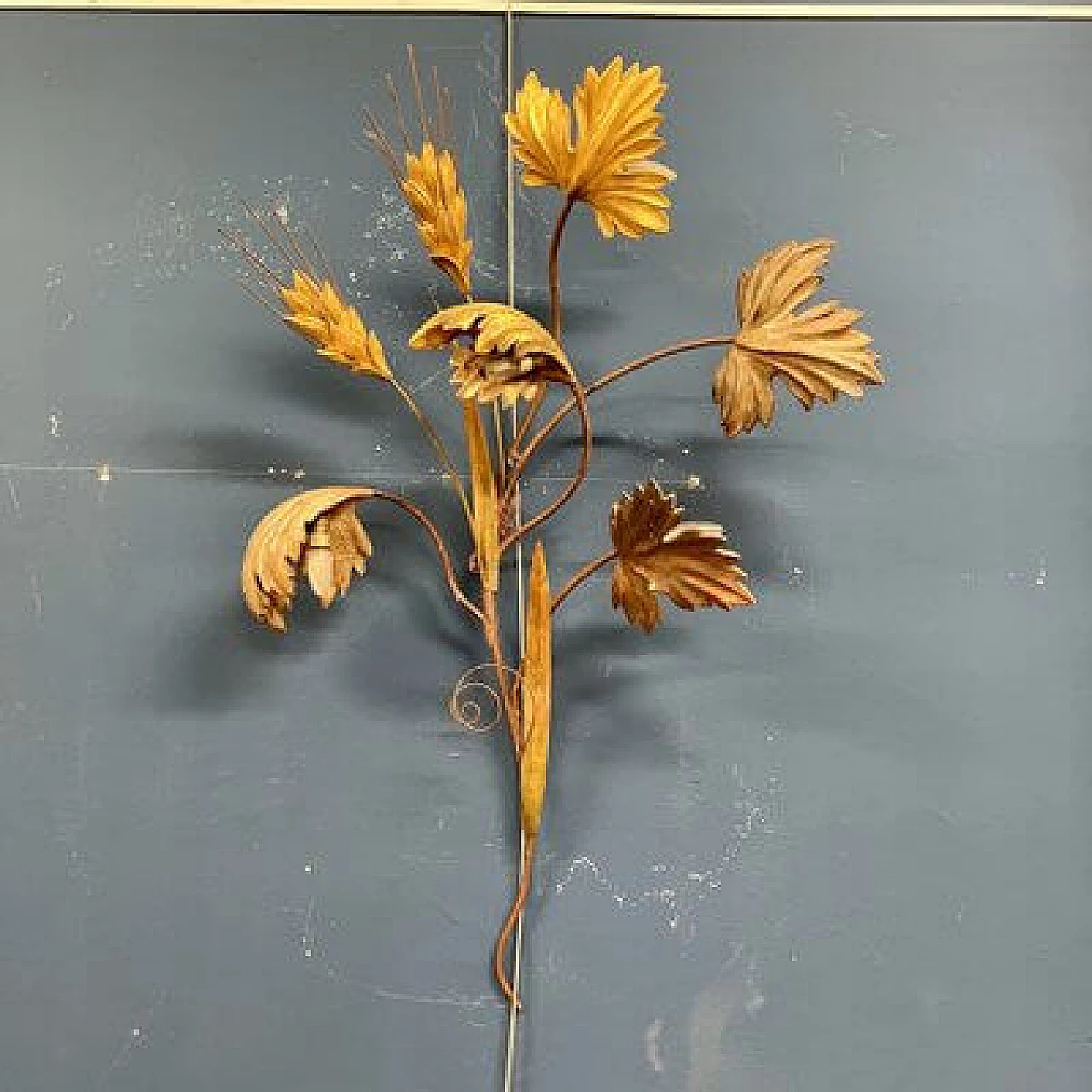 Metal and gilded wood wall light with vine leaves and spikes 1