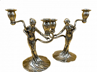 Coppia di candelieri a due lumi in metallo con donna di WMF, inizio '900