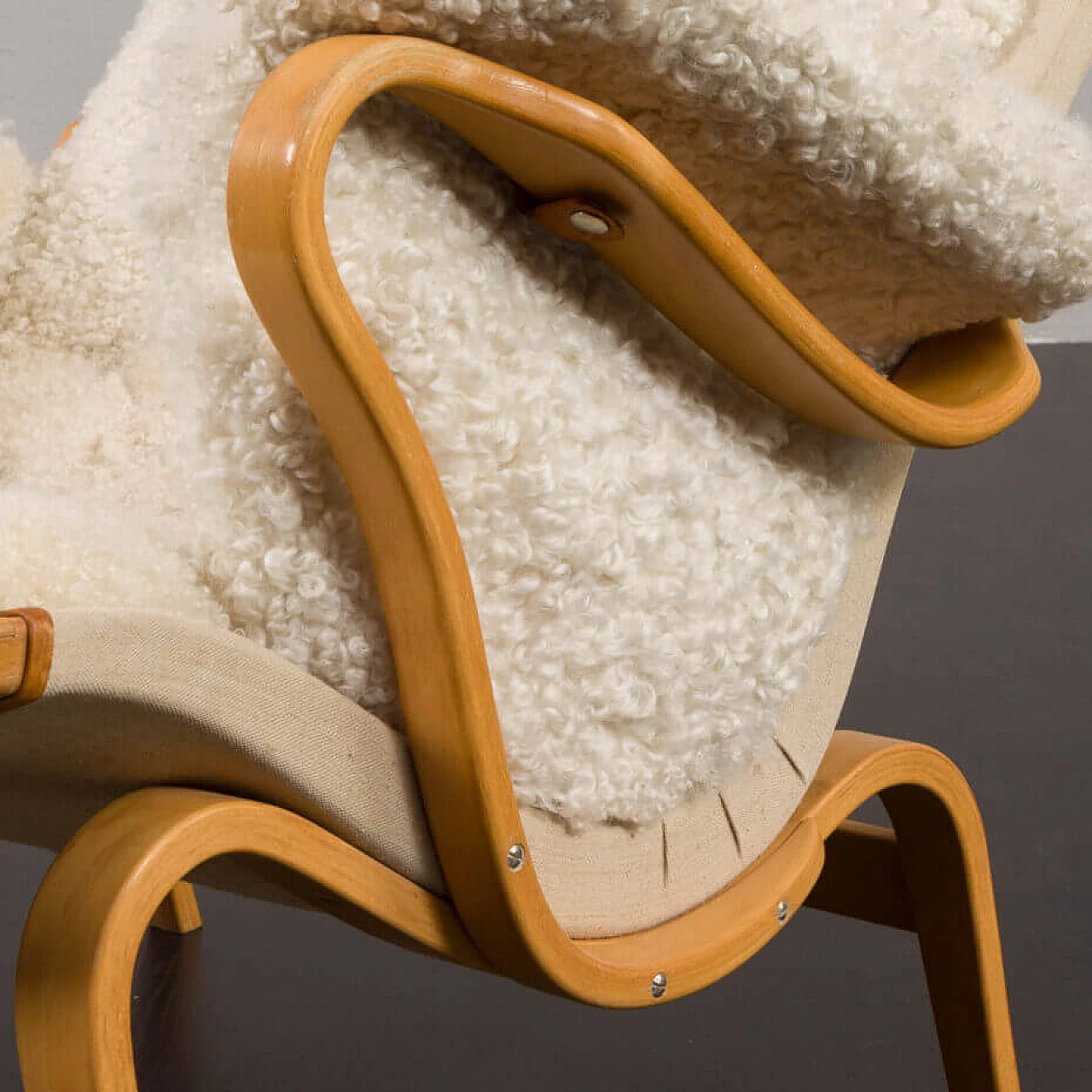 Pernilla armchair in bent beech and natural sheepskin by Bruno Mathsson for Dux, 1960s 9
