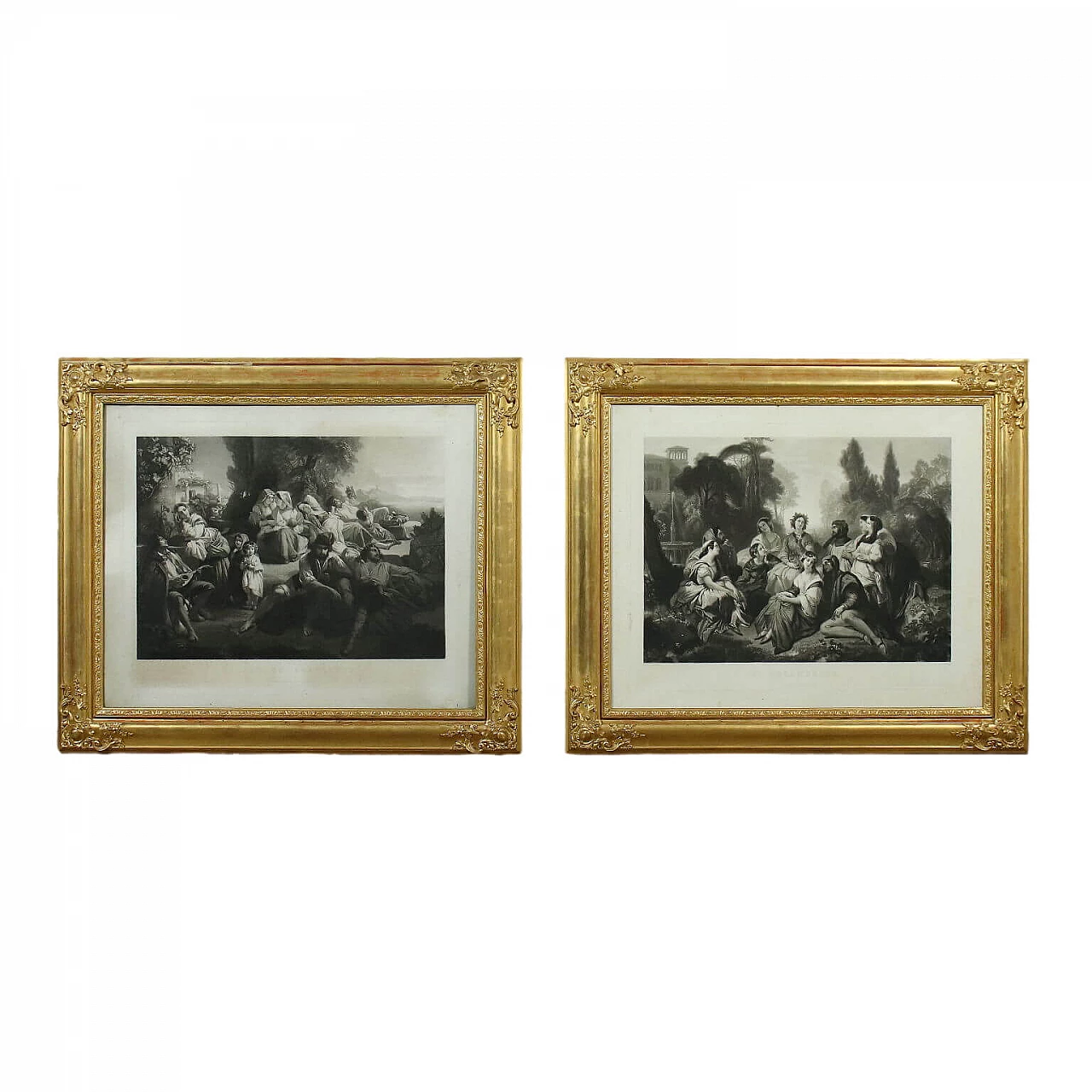 Pair of carved and gilded wooden frames with engravings, 19th century 1