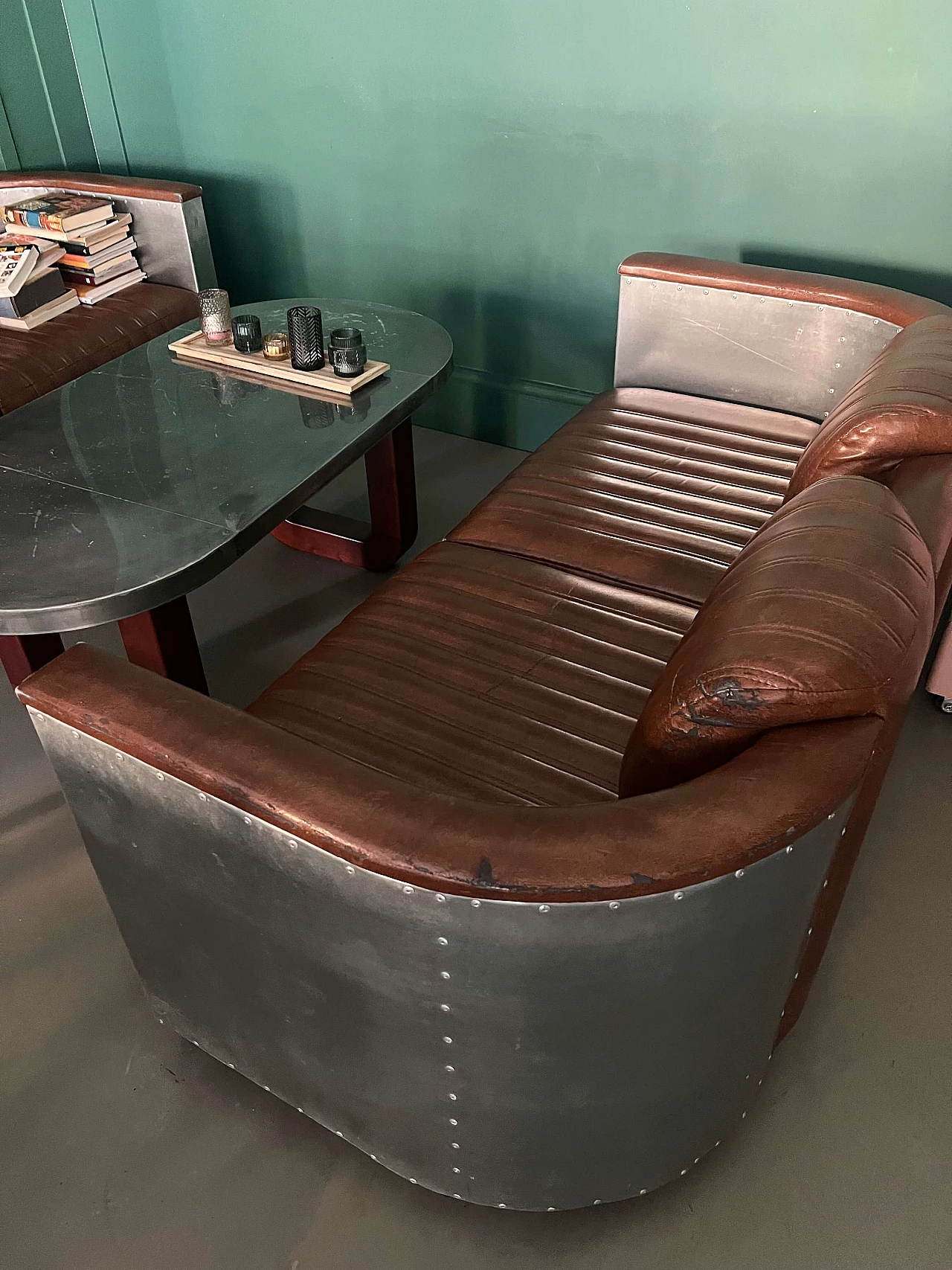 Pair of leather and metal Art Deco sofas and coffee table, 2000s 3