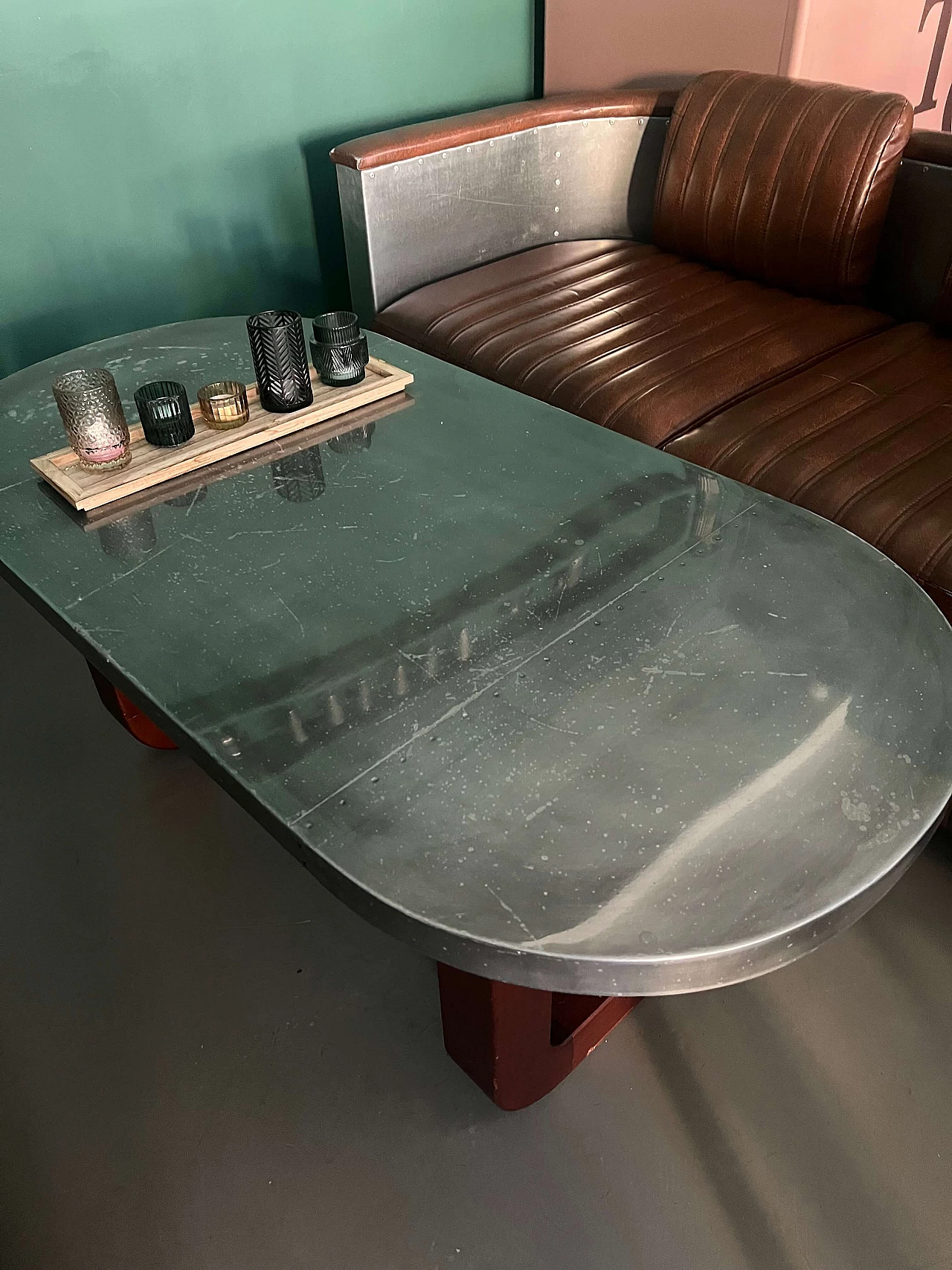 Pair of leather and metal Art Deco sofas and coffee table, 2000s 6