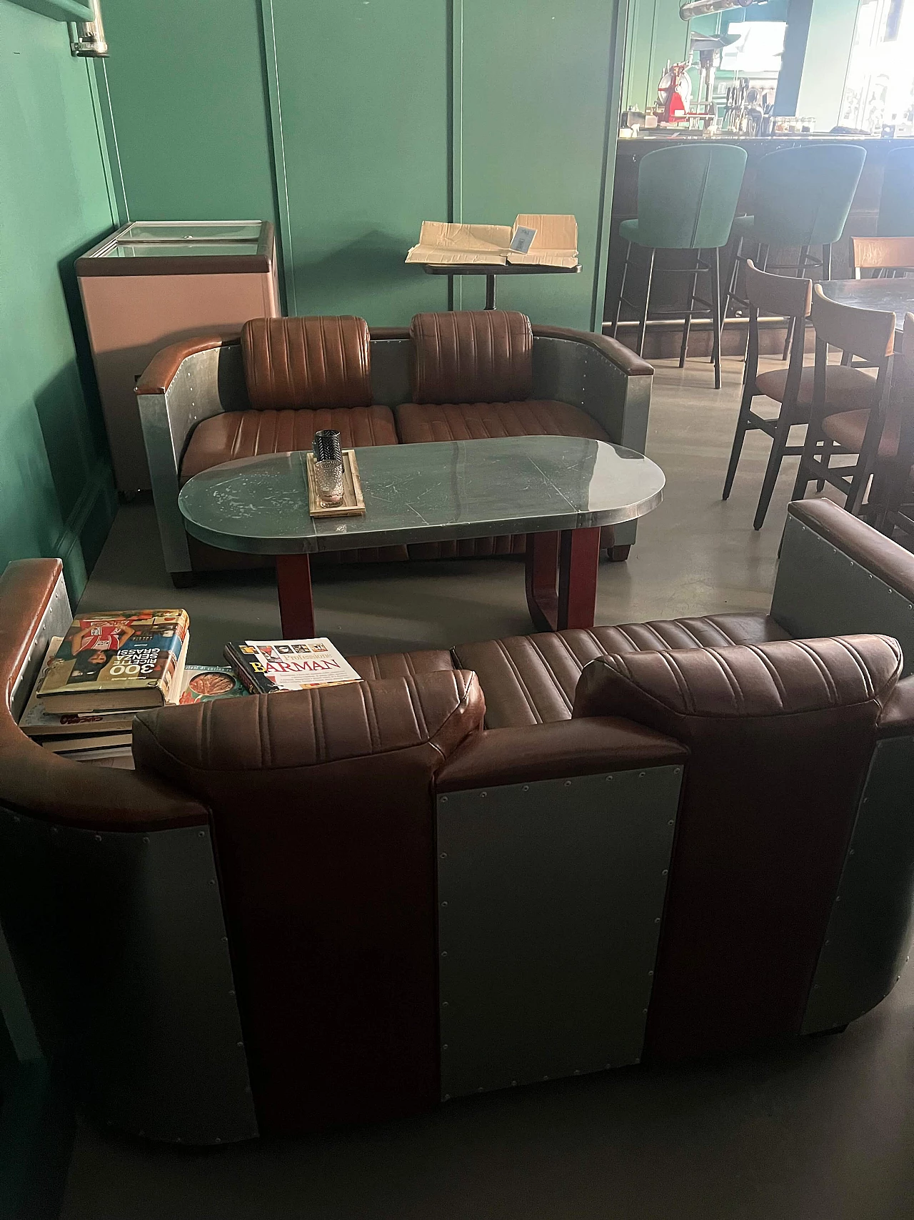 Pair of leather and metal Art Deco sofas and coffee table, 2000s 10