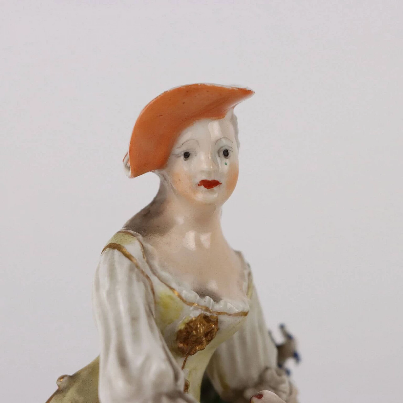 Pair of polychrome porcelain figurines, 19th century 8