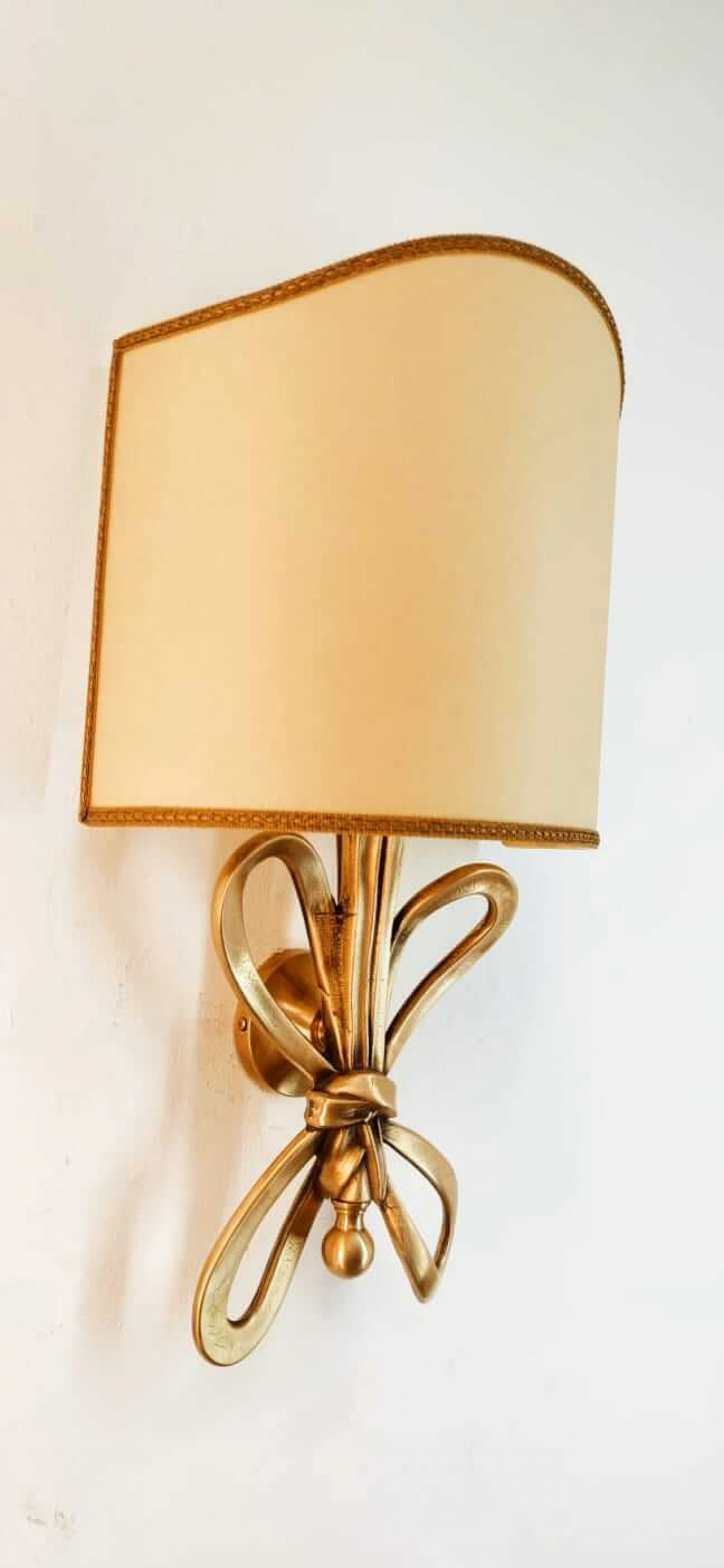 Wall sconce with brass bow and parchment fan diffuser, 1960s 2