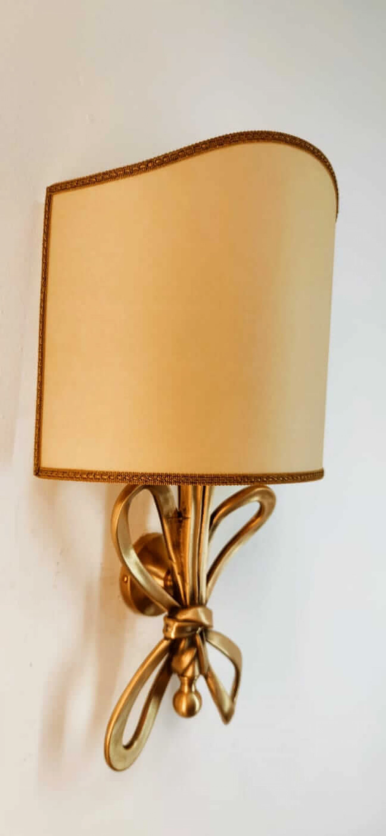 Wall sconce with brass bow and parchment fan diffuser, 1960s 4