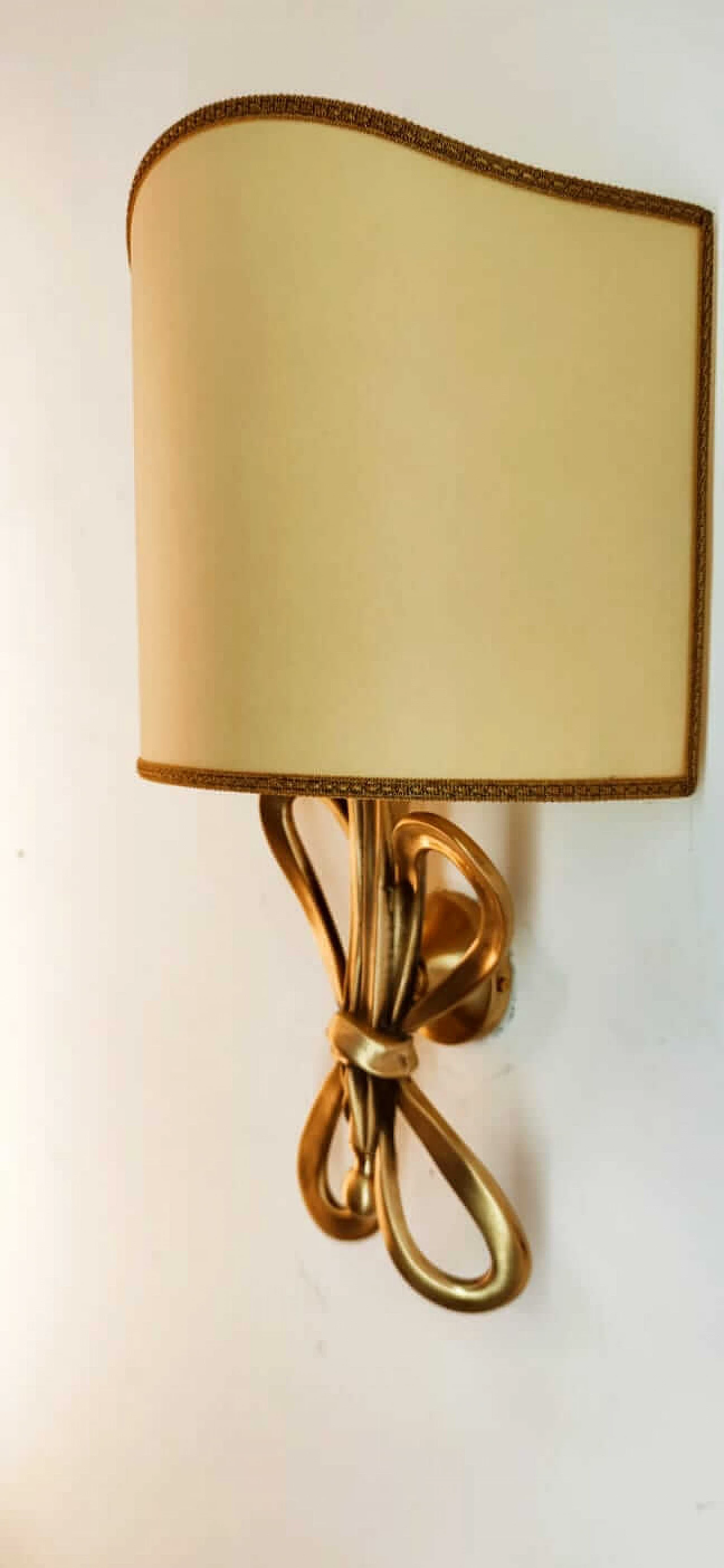 Wall sconce with brass bow and parchment fan diffuser, 1960s 5