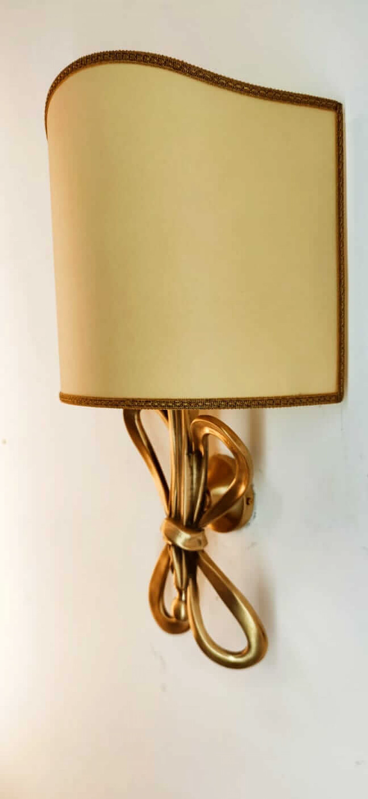 Wall sconce with brass bow and parchment fan diffuser, 1960s 6