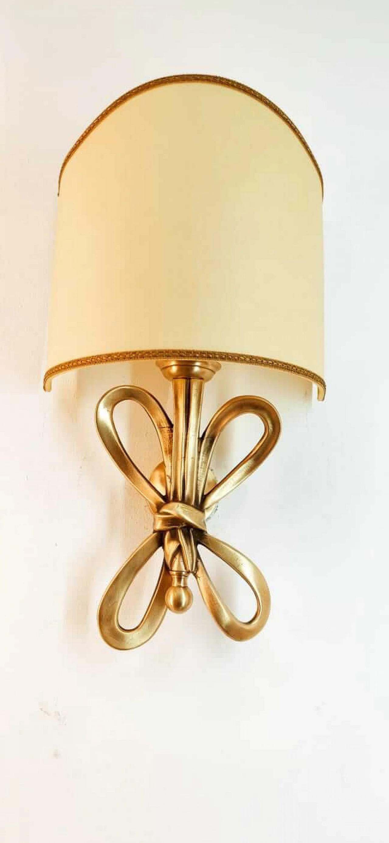 Wall sconce with brass bow and parchment fan diffuser, 1960s 7