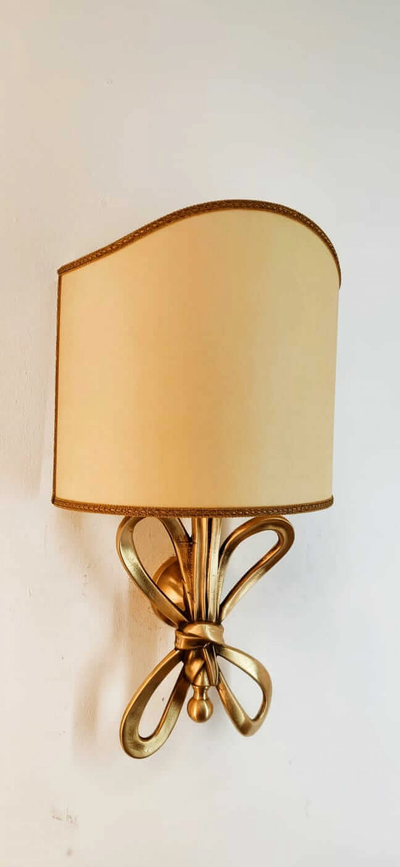 Wall sconce with brass bow and parchment fan diffuser, 1960s 9