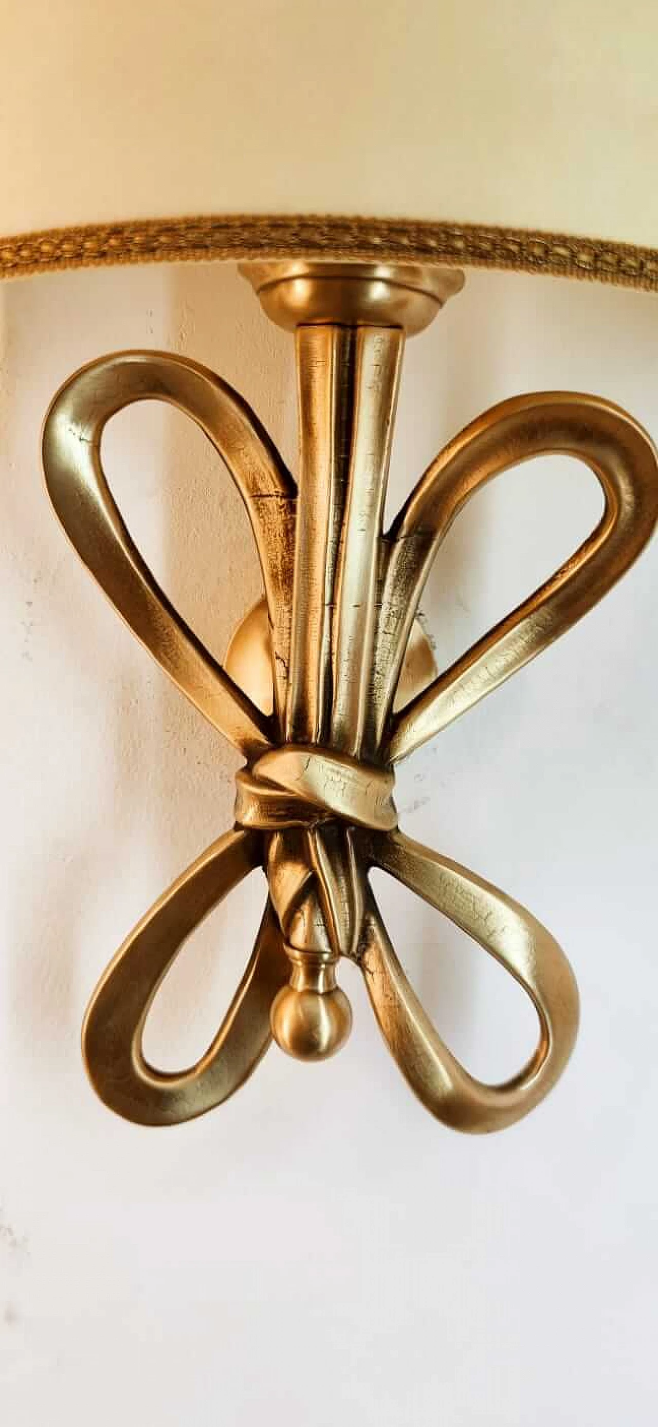 Wall sconce with brass bow and parchment fan diffuser, 1960s 10