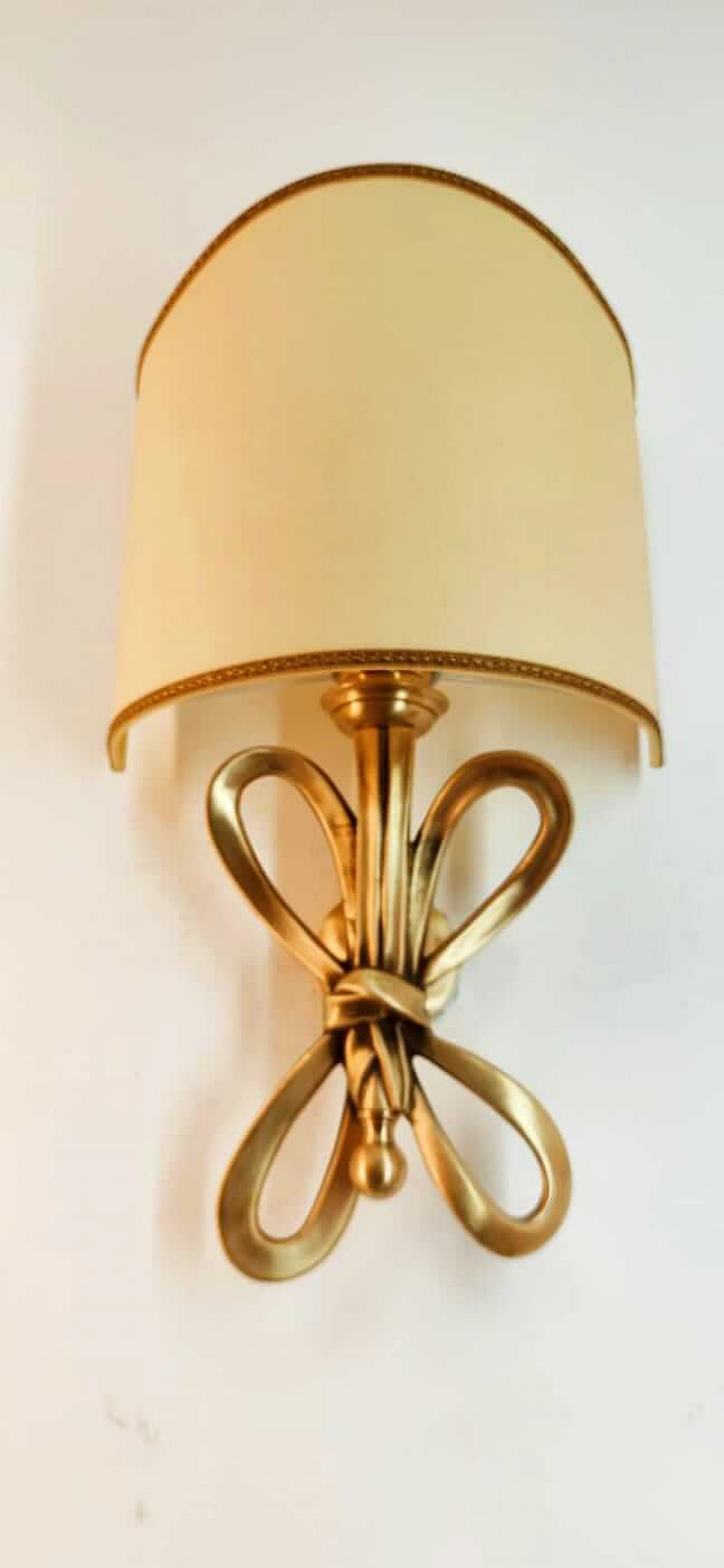 Wall sconce with brass bow and parchment fan diffuser, 1960s 11