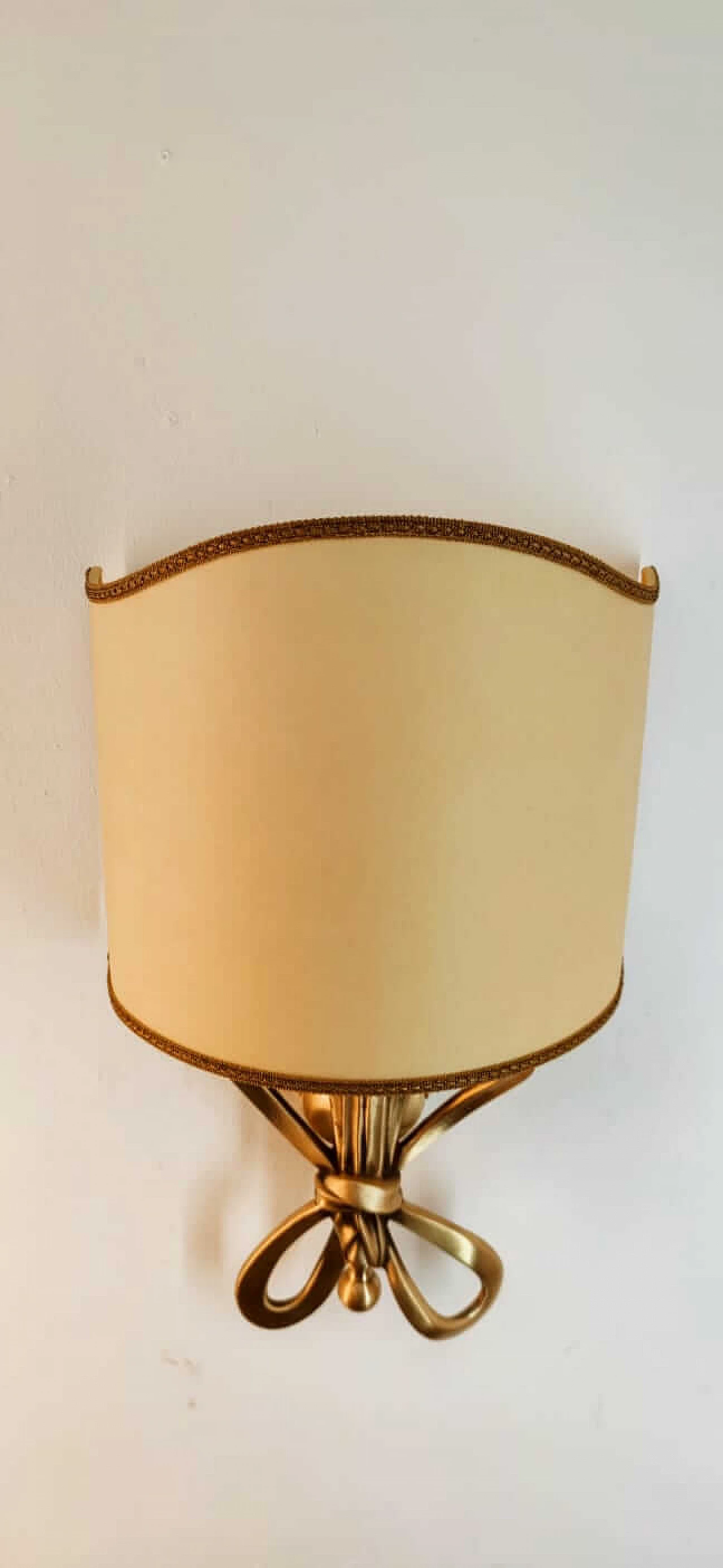 Wall sconce with brass bow and parchment fan diffuser, 1960s 12