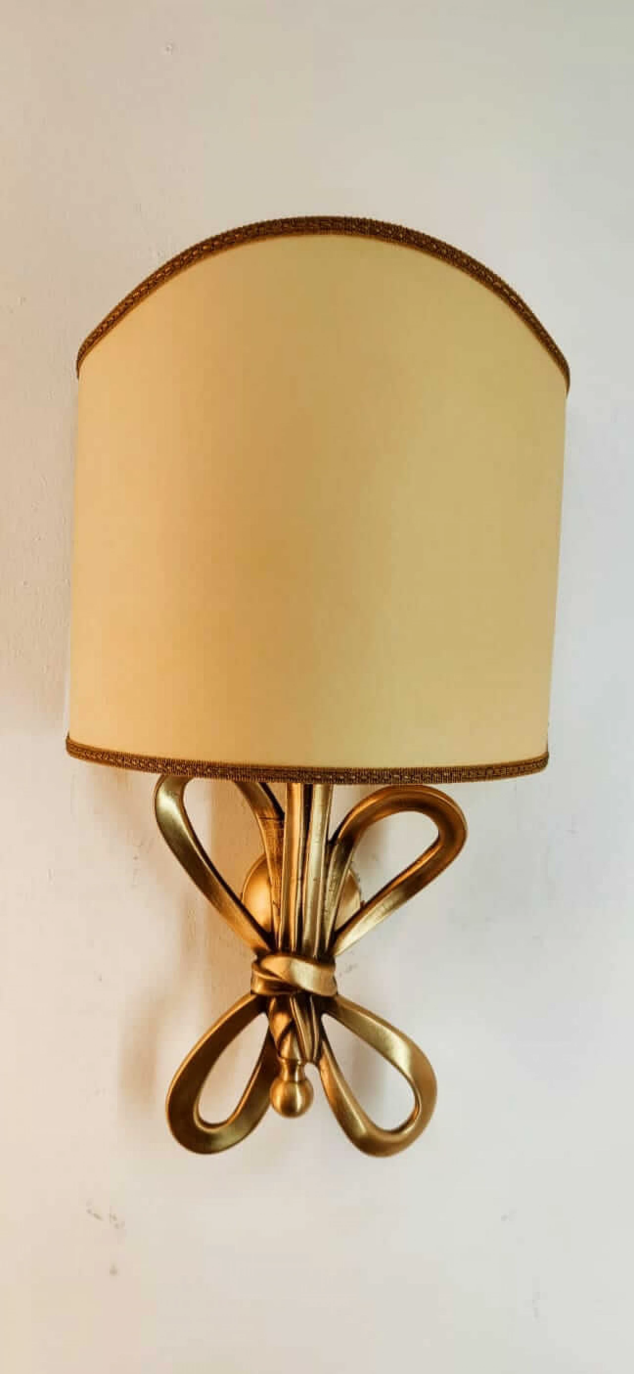 Wall sconce with brass bow and parchment fan diffuser, 1960s 13