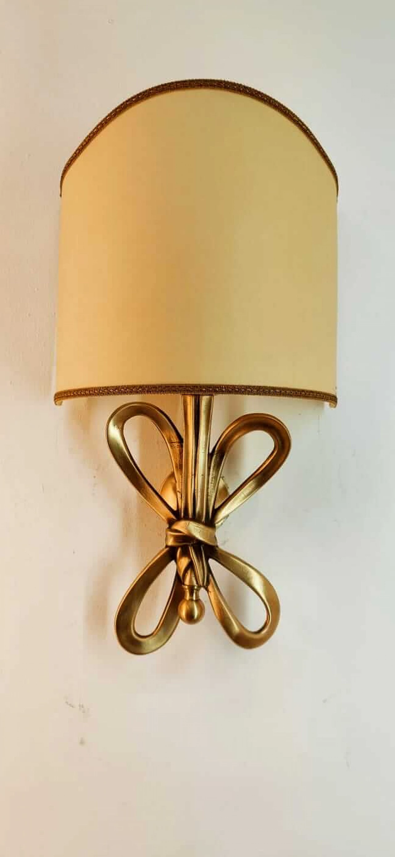 Wall sconce with brass bow and parchment fan diffuser, 1960s 14