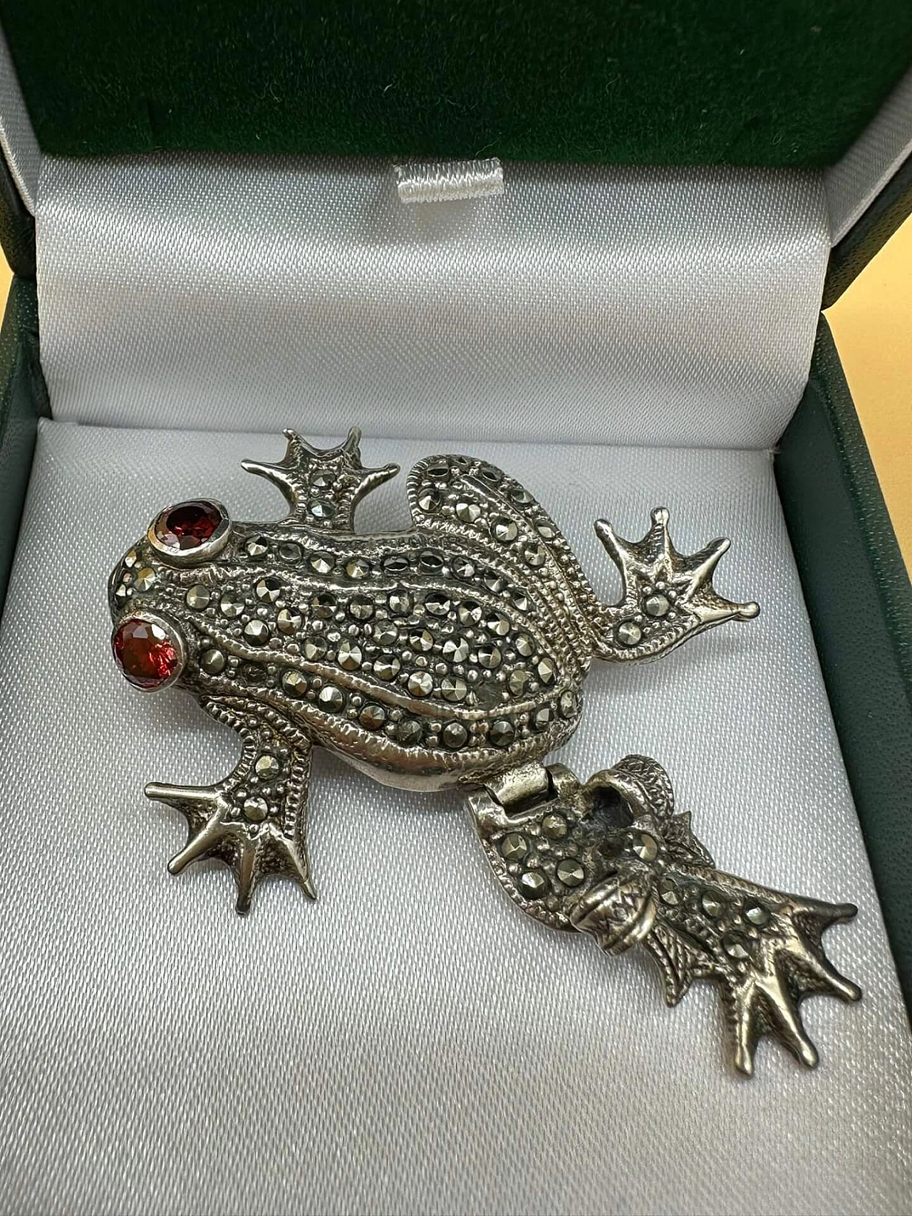 Silver frog brooch with rhinestones and rubies, early 20th century 1