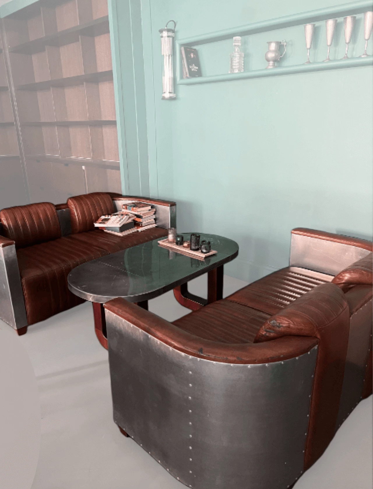 Pair of leather and metal Art Deco sofas and coffee table, 2000s 11